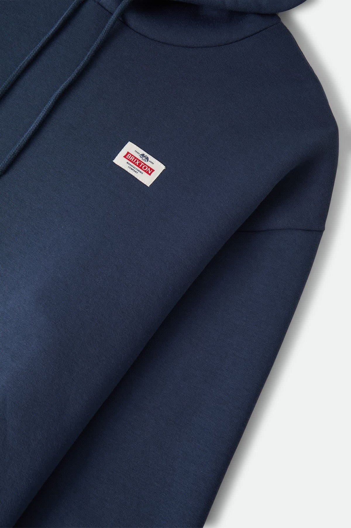 Brixton Trademark Hoodie - Washed Navy – chest label detail