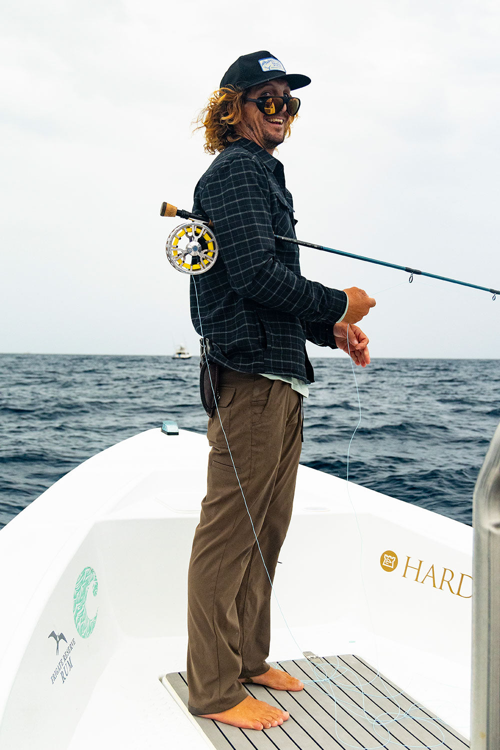 Salty Crew Fathom Tech Flannel - Black Grey – worn on a boat